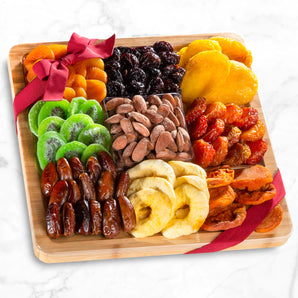 Dried Fruit Assortment with Almonds on Bamboo Cutting Board Serving Tray